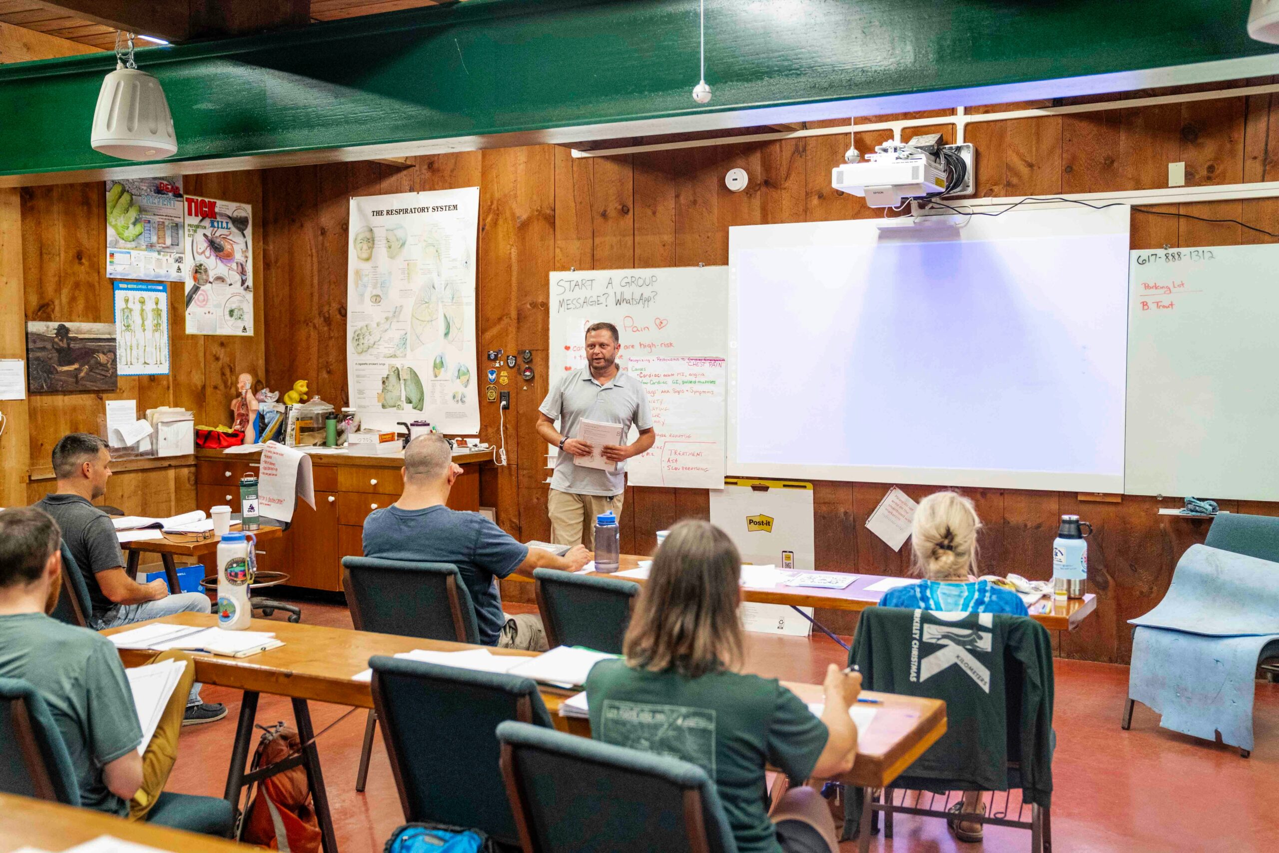 Teacher presenting an activity to students in a classroom