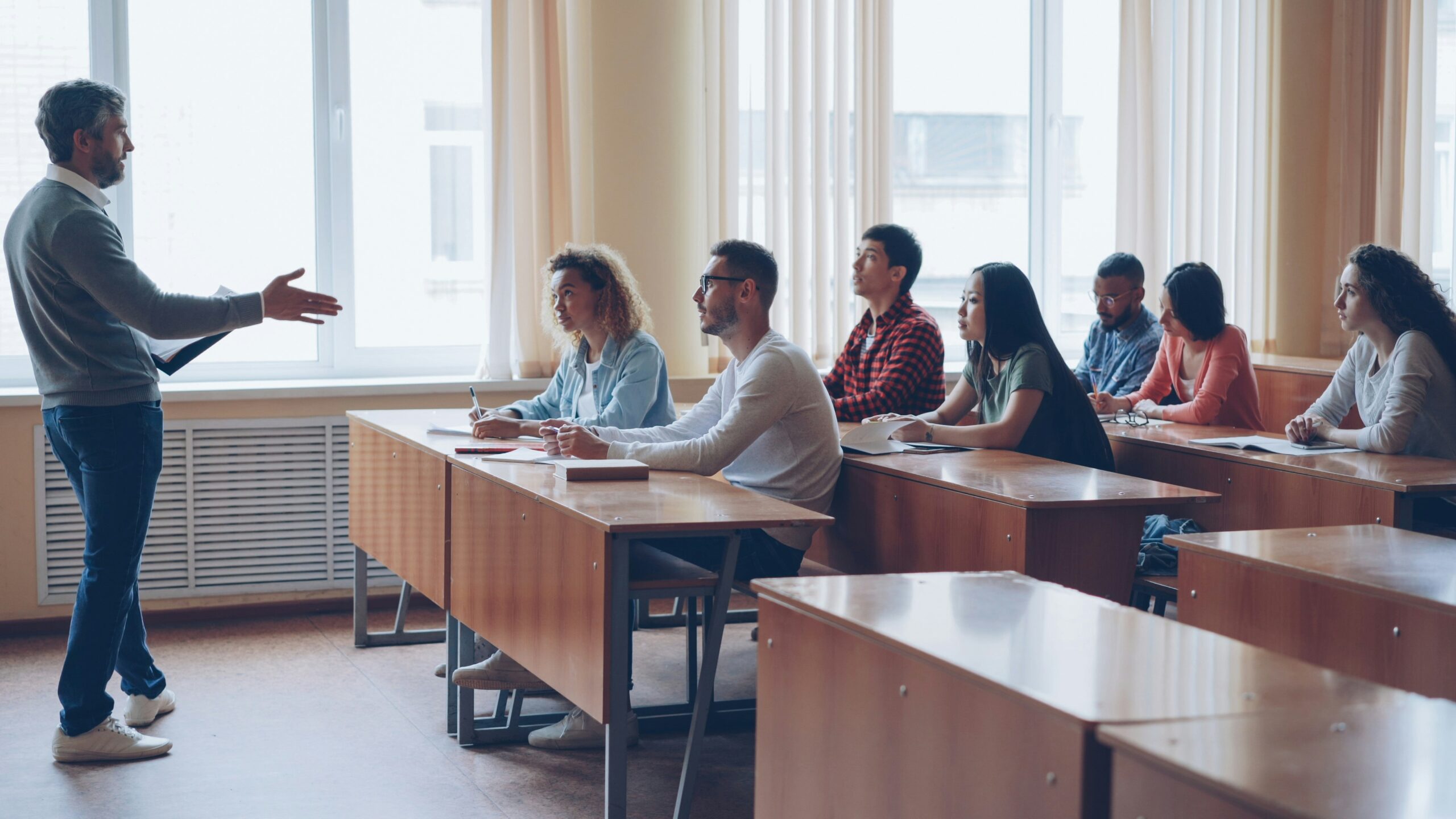 Teacher leading a classroom discussion with students